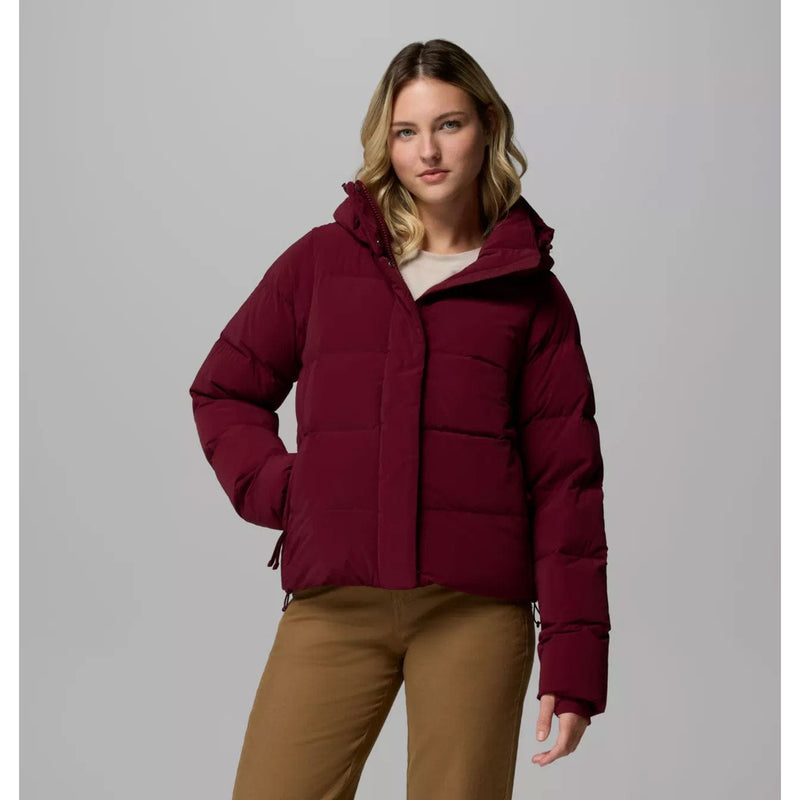 Load image into Gallery viewer, Woman wearing a maroon puffer jacket on a gray background