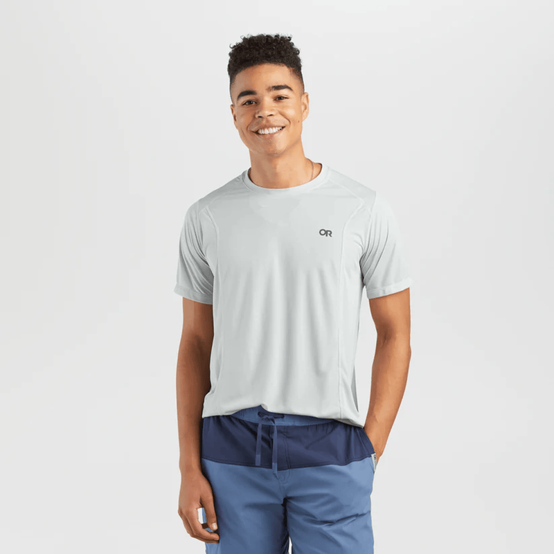 Load image into Gallery viewer, Man wearing a light gray t-shirt with a logo on a white background