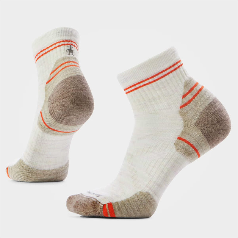 Load image into Gallery viewer, Pair of white socks with brown and orange accents on a light gray background