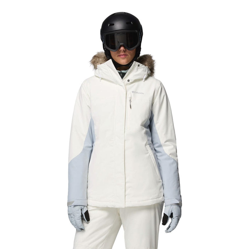 Load image into Gallery viewer, Person wearing a white ski jacket with gray sleeves, black helmet, and goggles on a white background