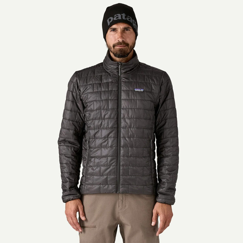 Load image into Gallery viewer, Man wearing a Patagonia jacket and beanie on a white background