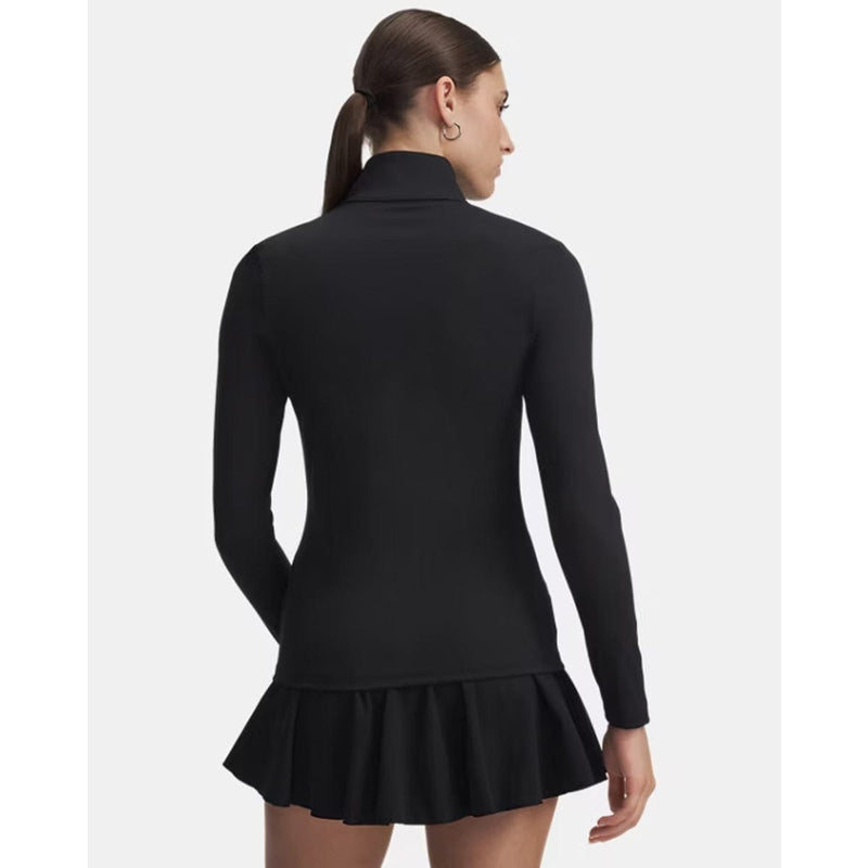Load image into Gallery viewer, Woman wearing a black long-sleeve dress with a skirt on a white background