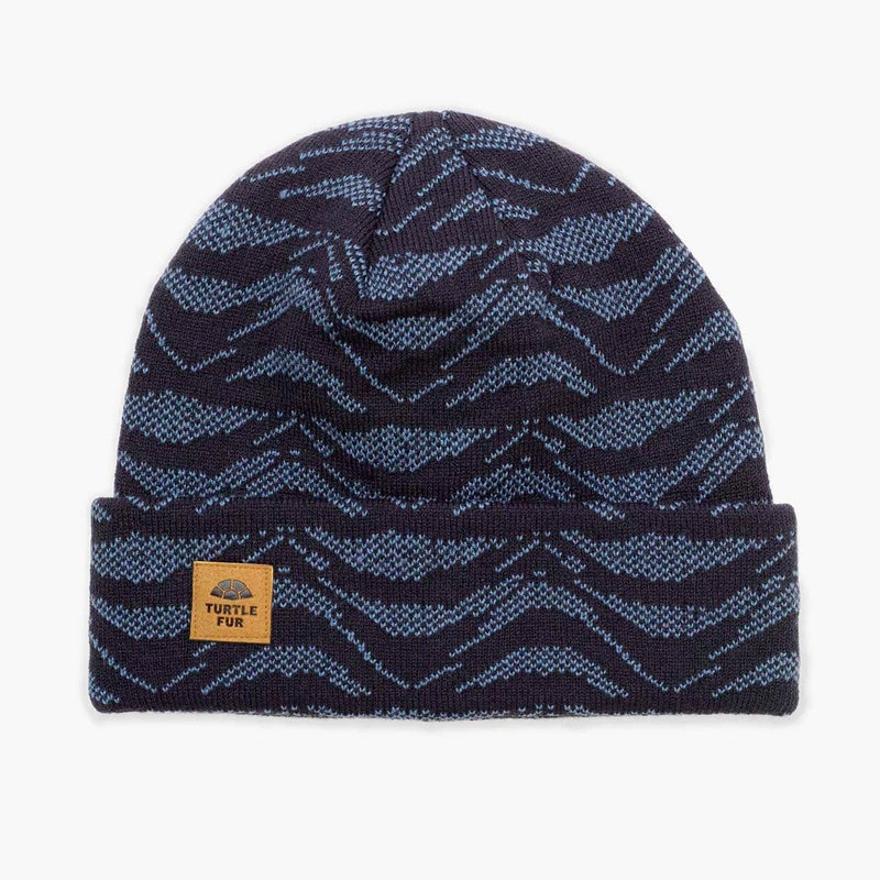 Load image into Gallery viewer, Navy blue beanie with blue zigzag pattern and brand label on a white background