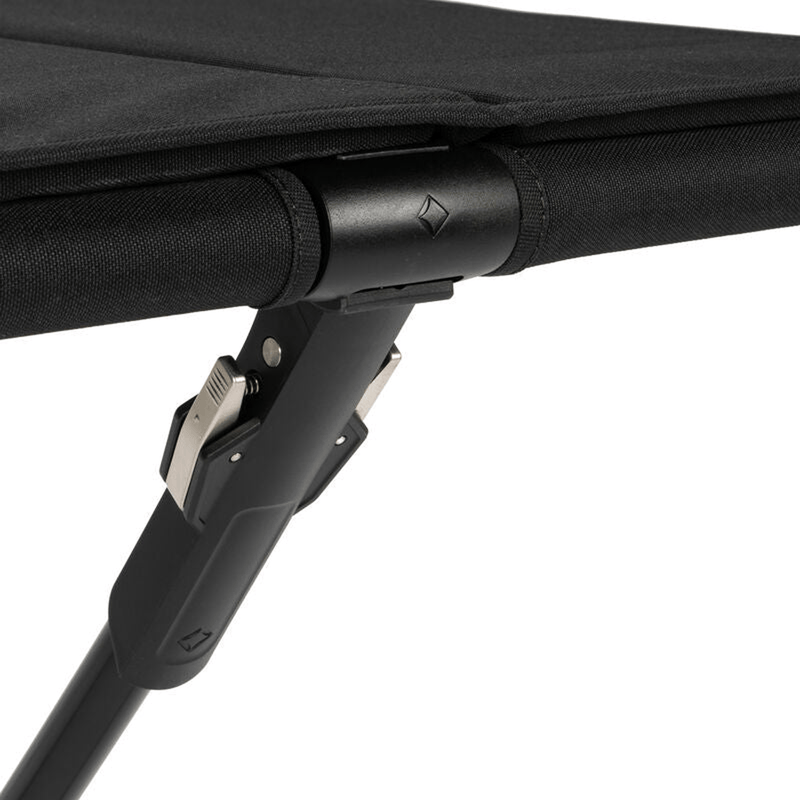 Load image into Gallery viewer, Close-up of a black folding chair with a white background