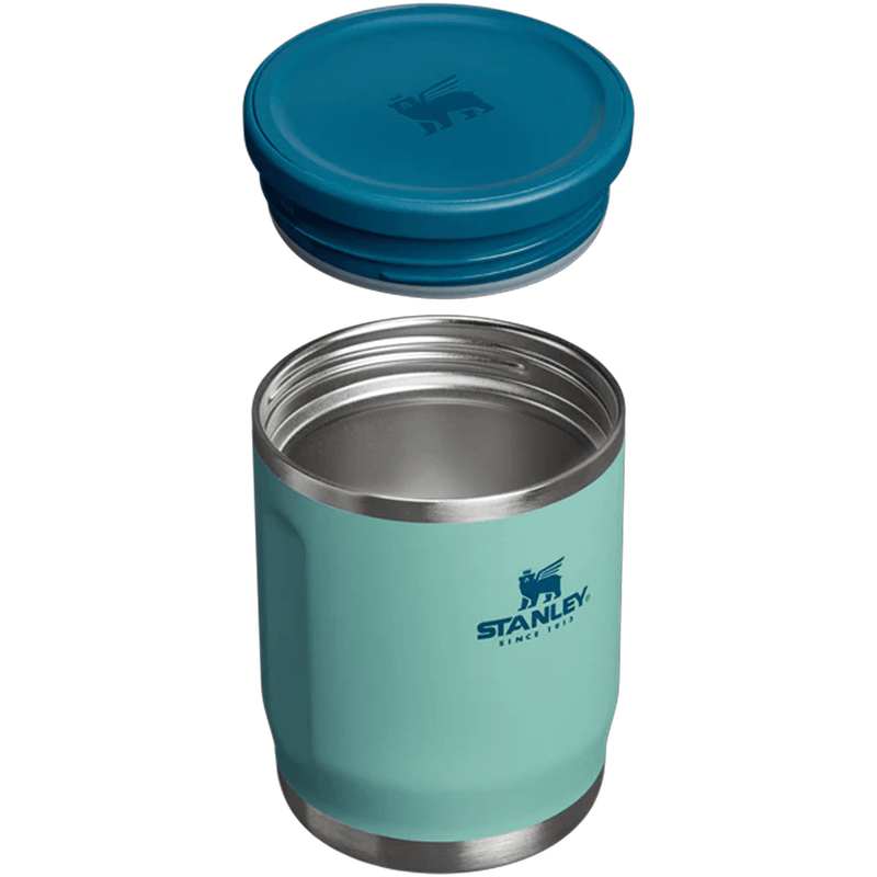 Load image into Gallery viewer, Teal Stanley insulated tumbler with blue lid on a white background