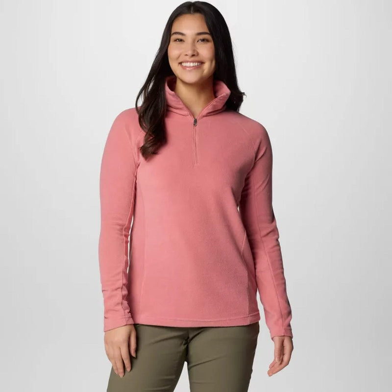 Load image into Gallery viewer, A woman wearing a PINK Columbia Glacial IV half zip fleece pullover with long sleeves.