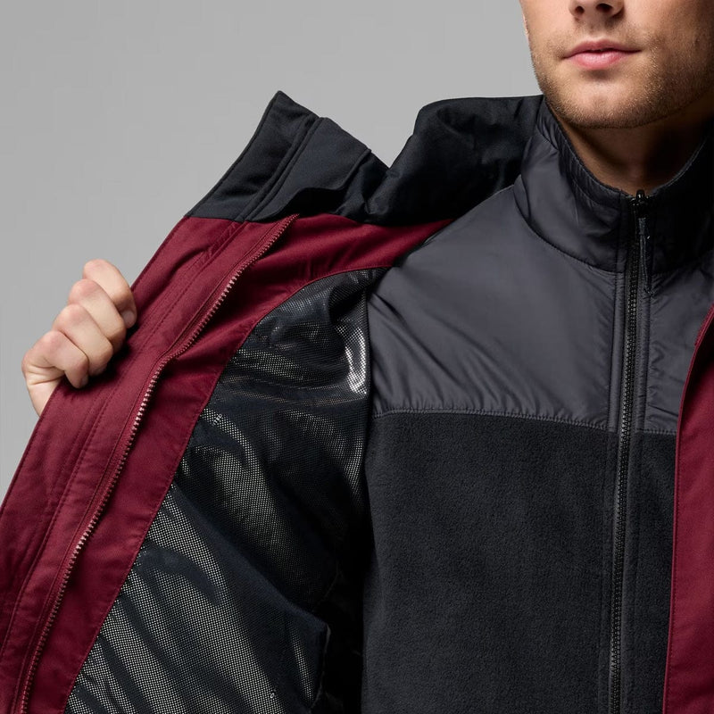 Load image into Gallery viewer, Person wearing a black and red jacket with a gray background