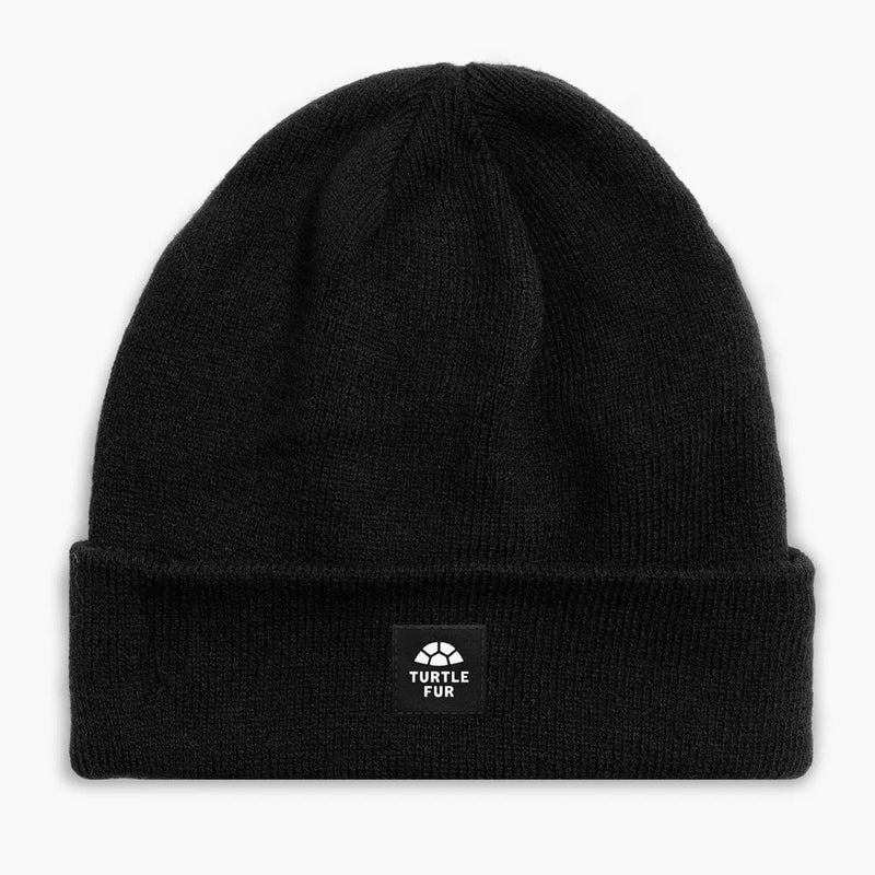 Load image into Gallery viewer, Black beanie with a visible brand logo on a white background