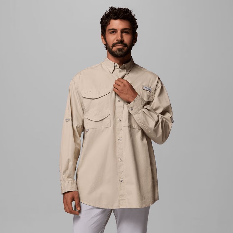 Load image into Gallery viewer, Man wearing a beige long-sleeve shirt with pockets on a gray background