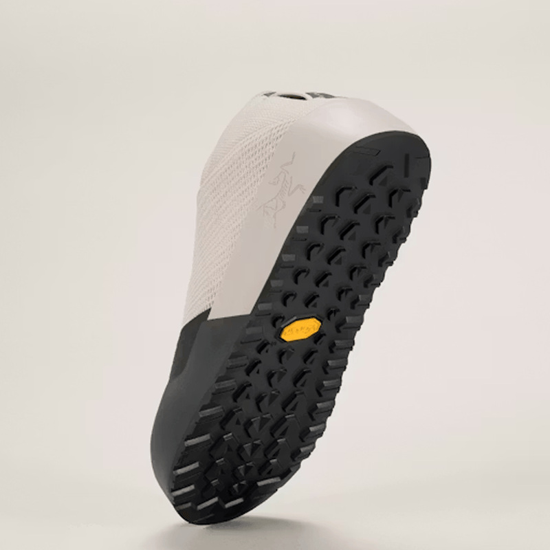 Load image into Gallery viewer, Sole of a shoe with black tread pattern on a light gray background