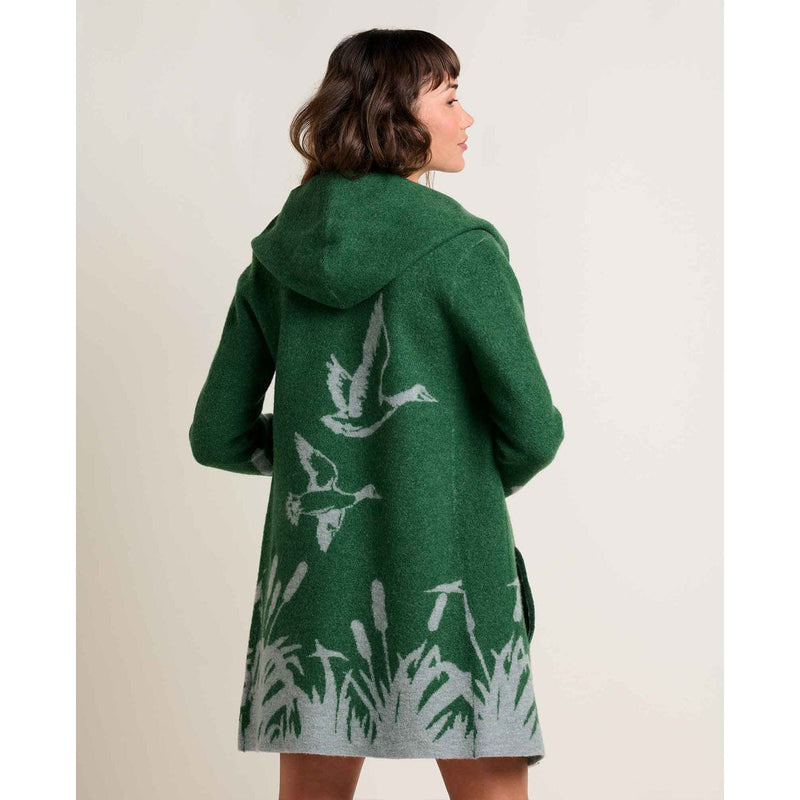 Load image into Gallery viewer, Green coat with white bird and plant pattern worn by a person on a plain background
