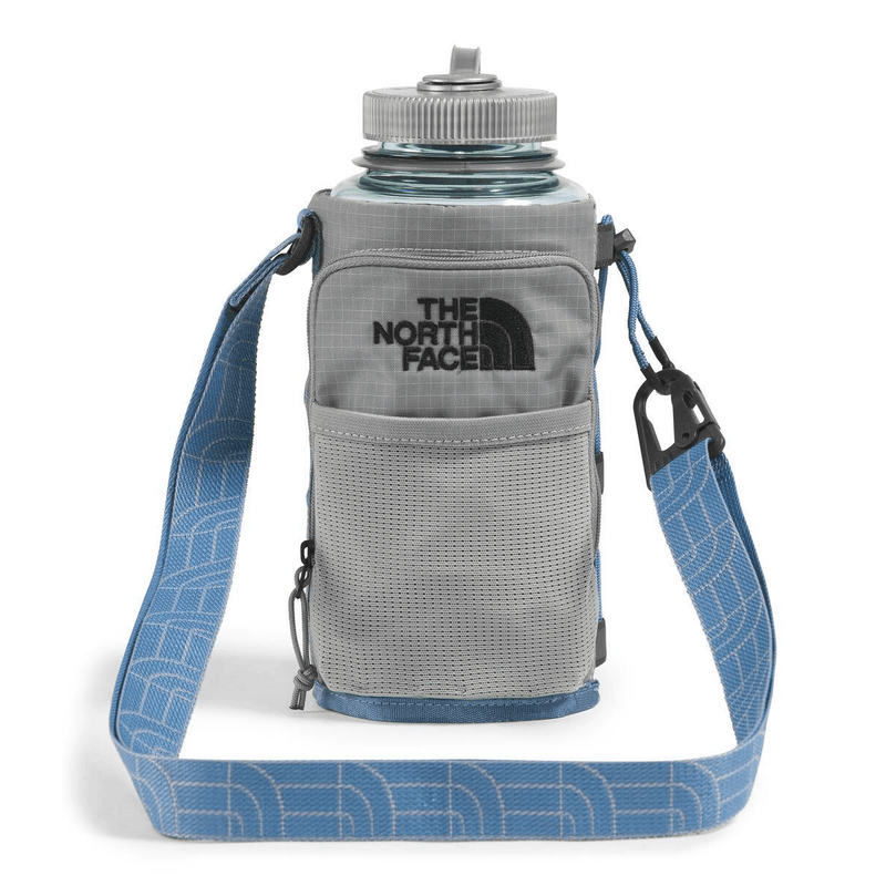 Load image into Gallery viewer, Gray water bottle holder with blue strap and The North Face logo on a white background