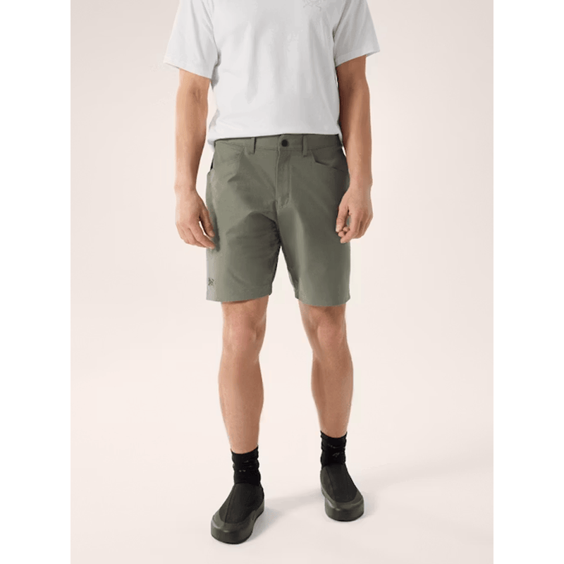Load image into Gallery viewer, Person wearing olive green shorts on a white background