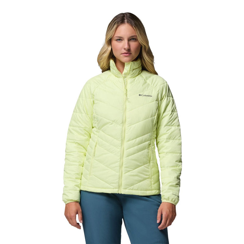 Load image into Gallery viewer, Woman wearing a light green jacket on a white background