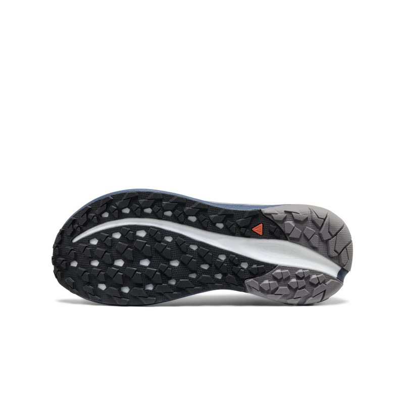 Load image into Gallery viewer, Close-up of a running shoe sole with tread pattern on a white background