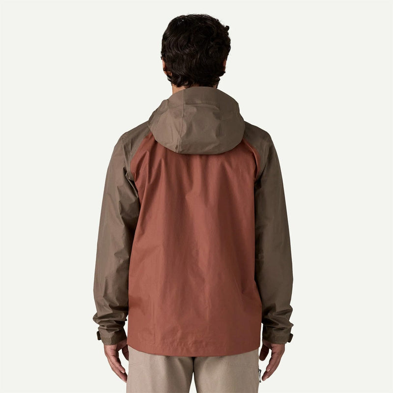 Load image into Gallery viewer, Person wearing a two-tone jacket with brown and beige sections on a white background