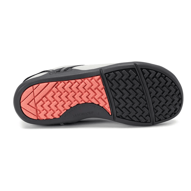 Load image into Gallery viewer, Close-up of a shoe sole with red and black tread pattern on a white background
