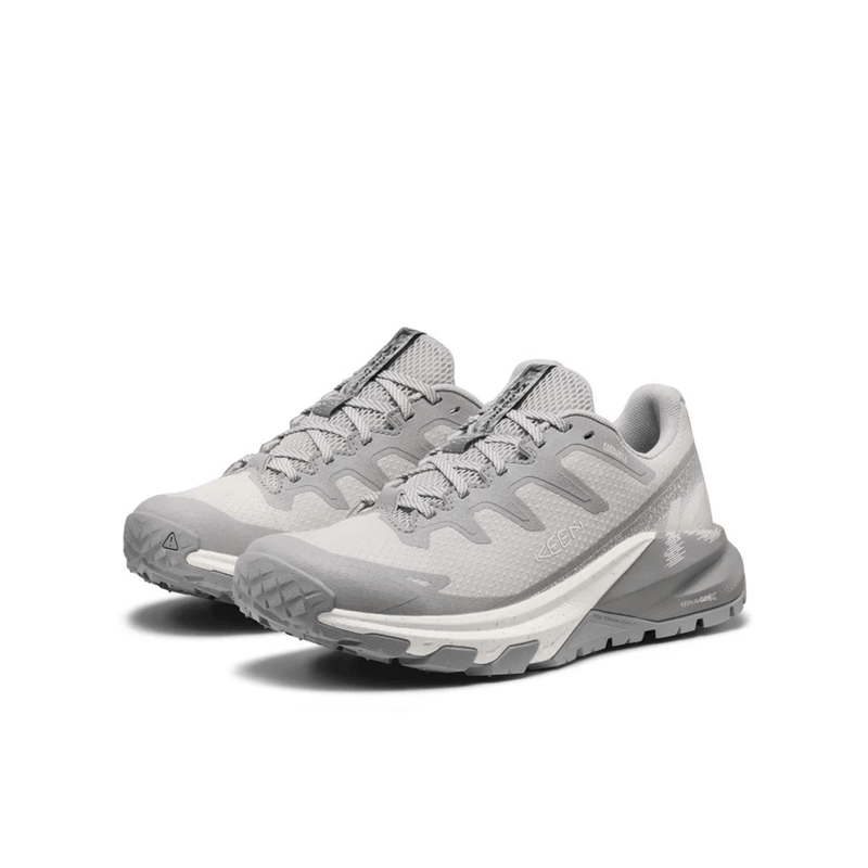 Load image into Gallery viewer, Pair of gray athletic shoes on a white background