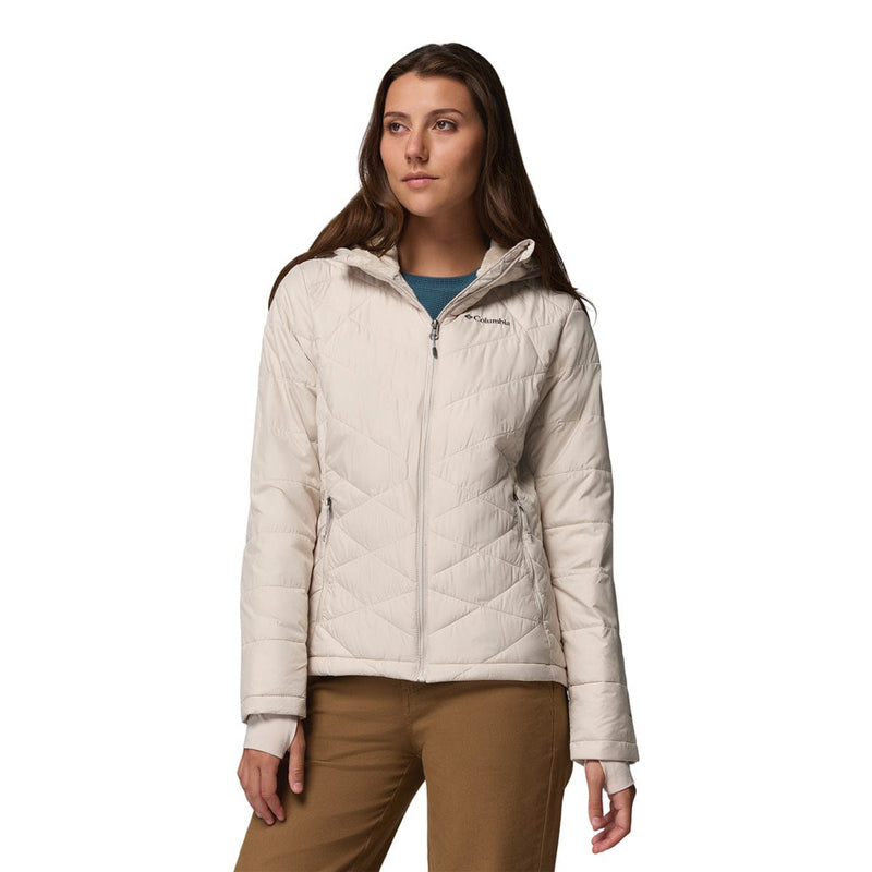 Load image into Gallery viewer, Woman wearing a beige quilted jacket on a white background