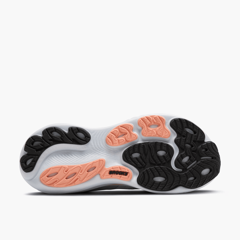 Load image into Gallery viewer, Close-up of a shoe sole with orange and black patterns on a white background