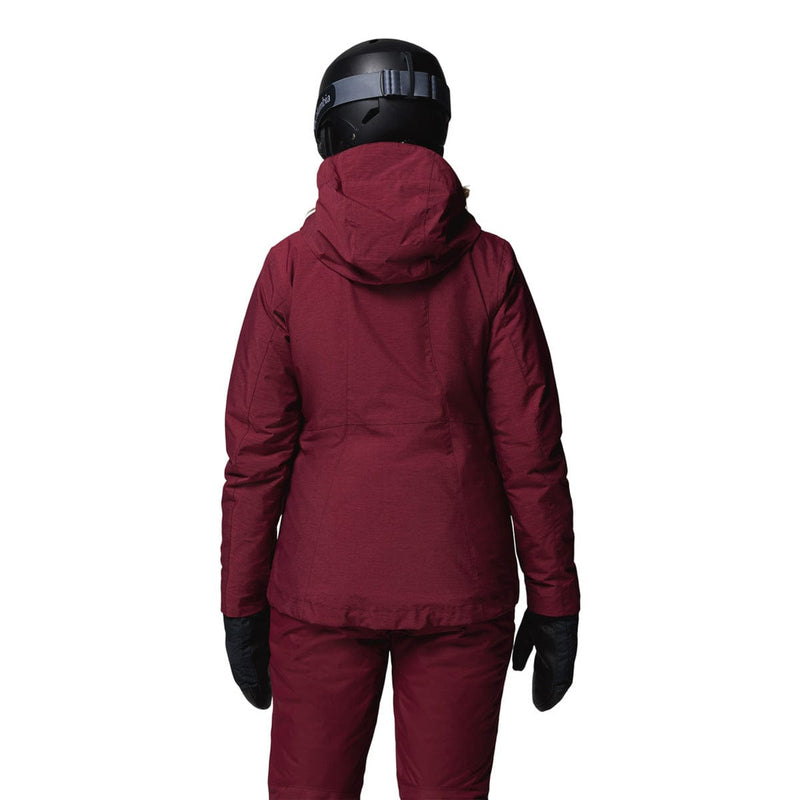 Load image into Gallery viewer, Person wearing a maroon snowsuit with a helmet on a white background