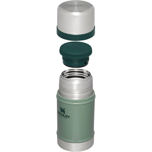 Green and silver Stanley insulated bottle on a white background