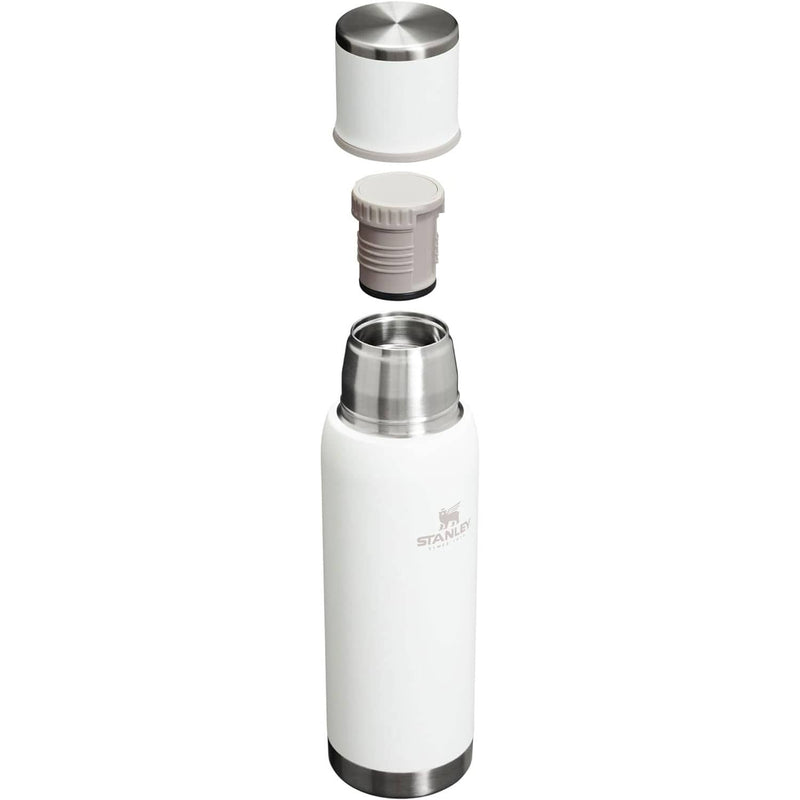 Load image into Gallery viewer, White thermos bottle with silver cap on a white background
