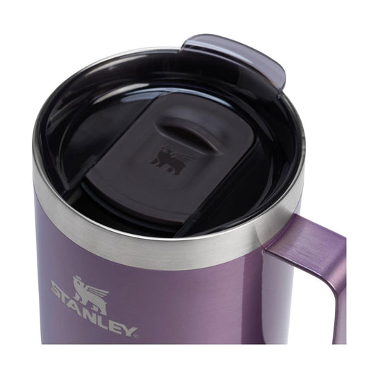 Purple Stanley travel mug with black lid on a white background