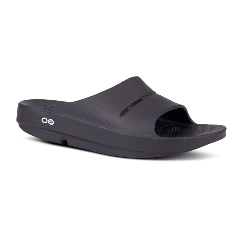 Load image into Gallery viewer, Black slide sandal with 'oo' logo on a white background
