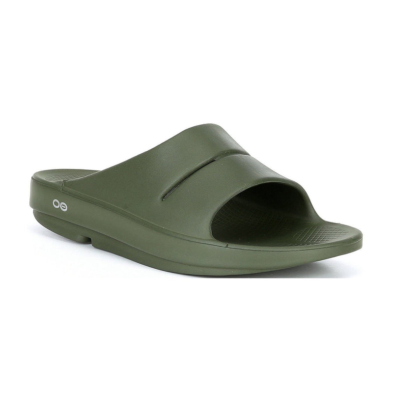 Load image into Gallery viewer, Oofos OOahh Slide sandal with a slip-on design, featuring the brand's logo on the strap.
