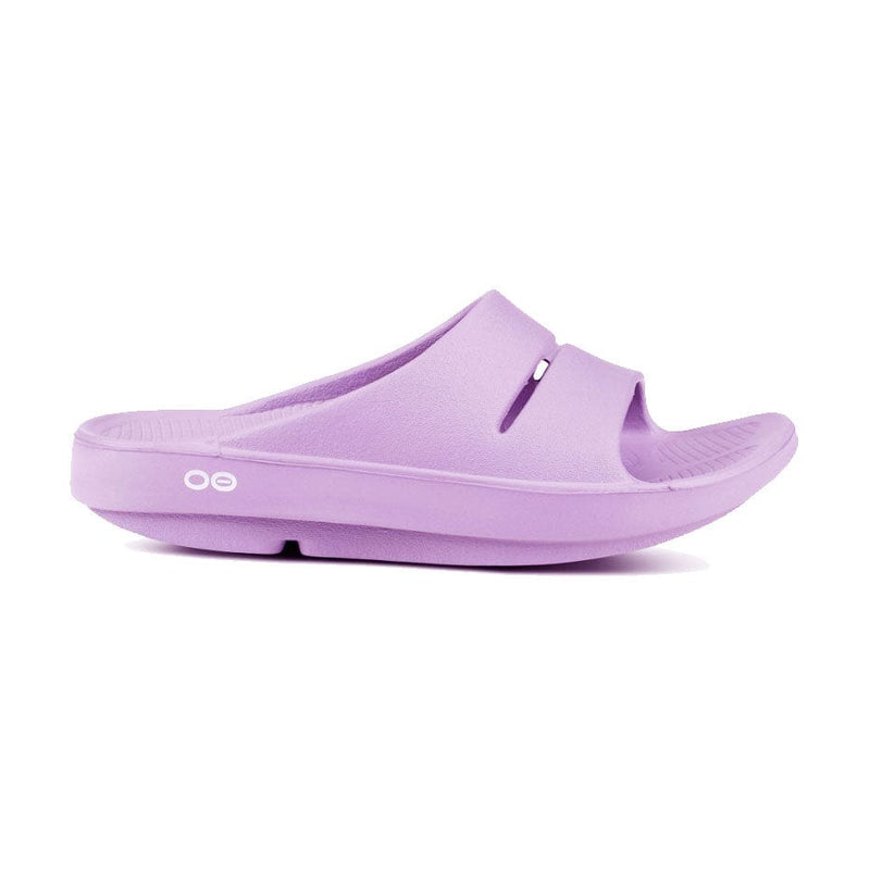 Load image into Gallery viewer, Oofos OOahh Slide sandal with a slip-on design, featuring the brand's logo on the strap.
