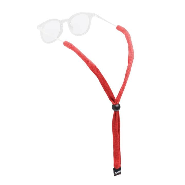 Load image into Gallery viewer, A black kids-sized cotton eyewear retainer with an adjustable bead, displayed with a pair of glasses.

