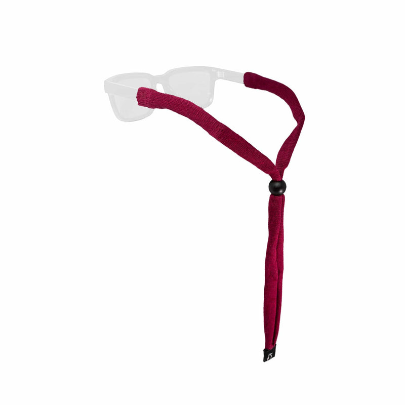 Load image into Gallery viewer, White sunglasses with a red strap on a white background
