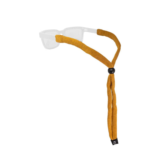 Sunglasses with a mustard yellow strap on a white background