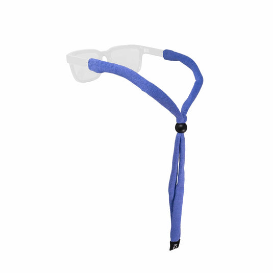 A blue textured fabric sunglasses strap with a black adjustment bead and black plastic clip, shown on a pair of clear-framed sunglasses against a white background.