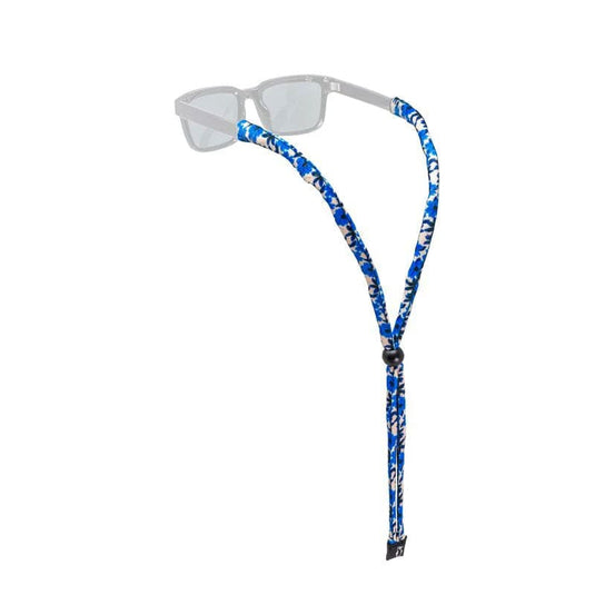 Glasses with a blue floral patterned strap on a white background