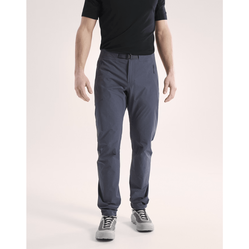 Load image into Gallery viewer, Person wearing dark gray pants on a light beige background
