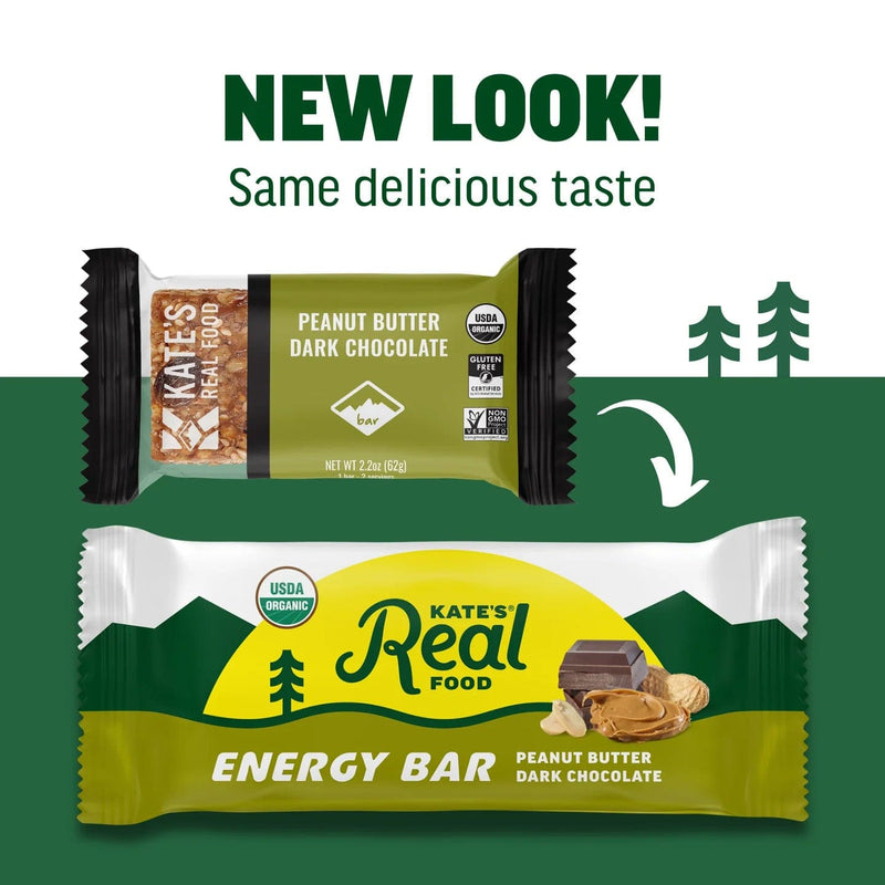 Load image into Gallery viewer, Two versions of Kate's Real Food energy bar packaging with a green background and trees.

