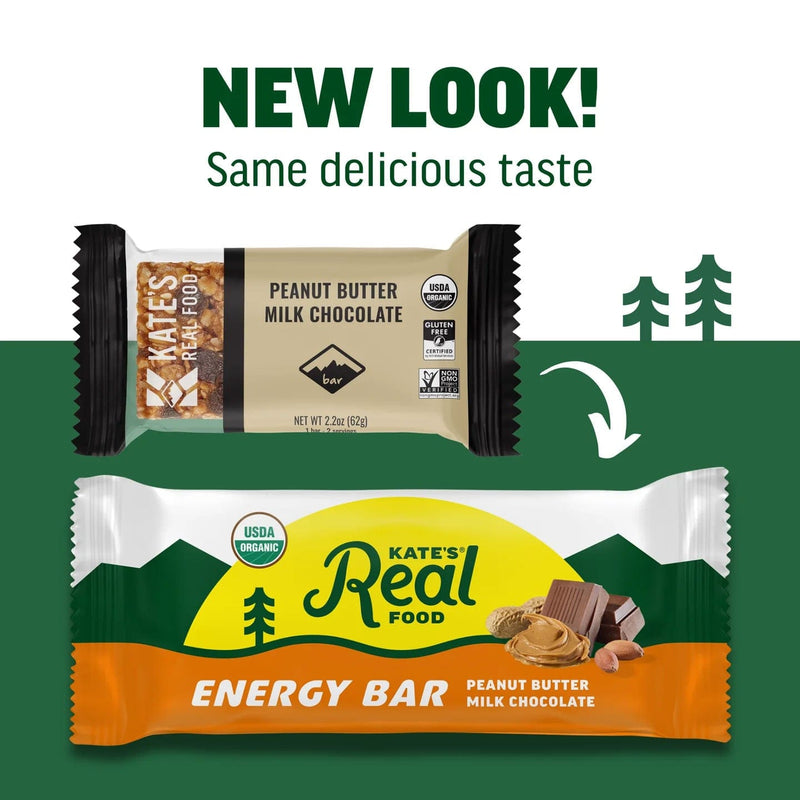Load image into Gallery viewer, Two versions of a Kate's Real Food energy bar packaging with a green background and trees.
