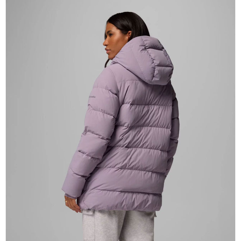Load image into Gallery viewer, Person wearing a purple puffer jacket on a gray background
