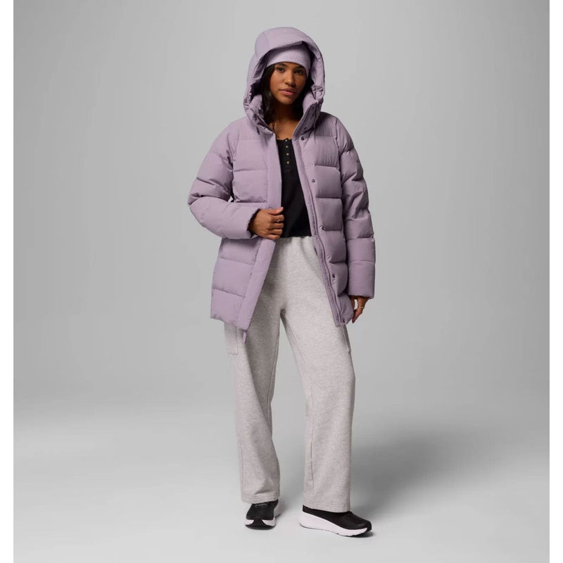 Load image into Gallery viewer, Person wearing a light purple puffer coat on a gray background

