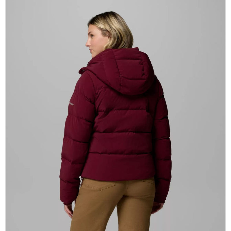 Load image into Gallery viewer, Person wearing a maroon puffer jacket on a gray background

