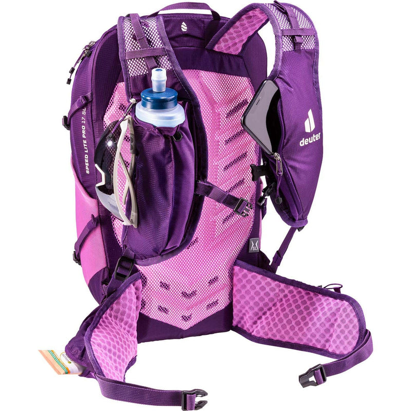 Load image into Gallery viewer, Purple and pink hydration backpack with water bottle on a white background
