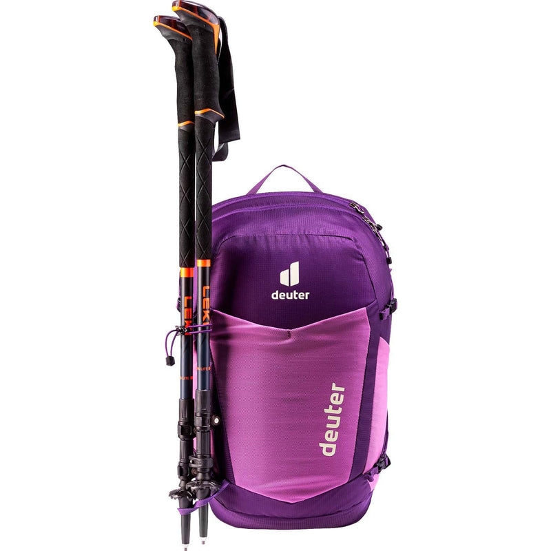 Load image into Gallery viewer, Purple backpack with ski poles attached on a white background
