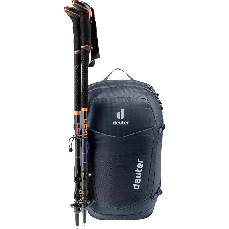 Load image into Gallery viewer, Black backpack with ski poles attached on a white background

