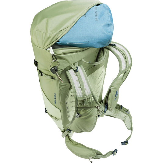 Green hiking backpack with a blue top section on a white background