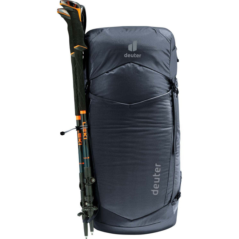 Load image into Gallery viewer, Gray hiking backpack with ski poles attached on a white background
