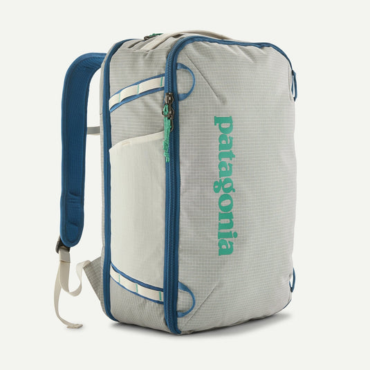white backpack with blue accents and Patagonia logo 