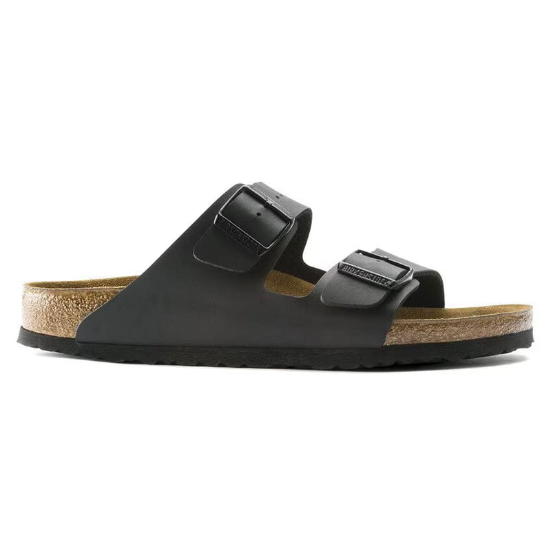 Load image into Gallery viewer, Black sandal with cork insole on a white background
