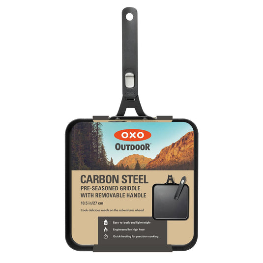 OXO Outdoor carbon steel pre-seasoned griddle with removable handle on a white background